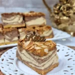 Sernik kajmakowy z prażonymi migdałami na kruchym cieście